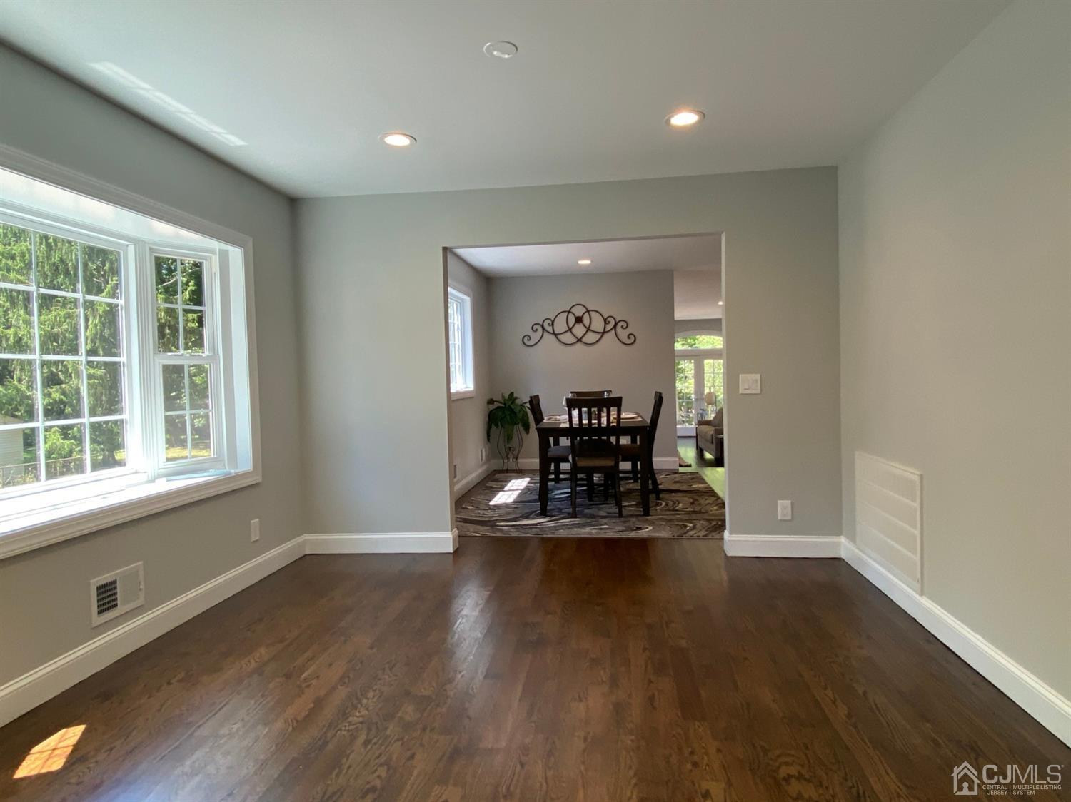 99 Jordan Road Colonia, NJ 07067 - Photo 12 of 53 a view of work space with wooden floor and windows