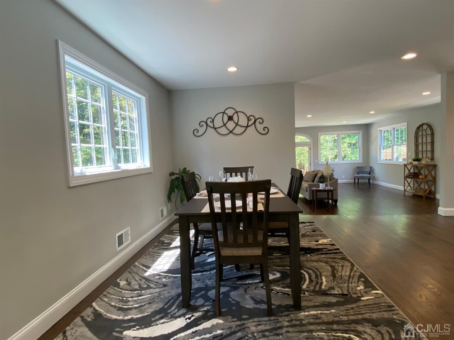99 Jordan Road Colonia, NJ 07067 - Photo 13 of 53 a view of a dining room with furniture window and wooden floor