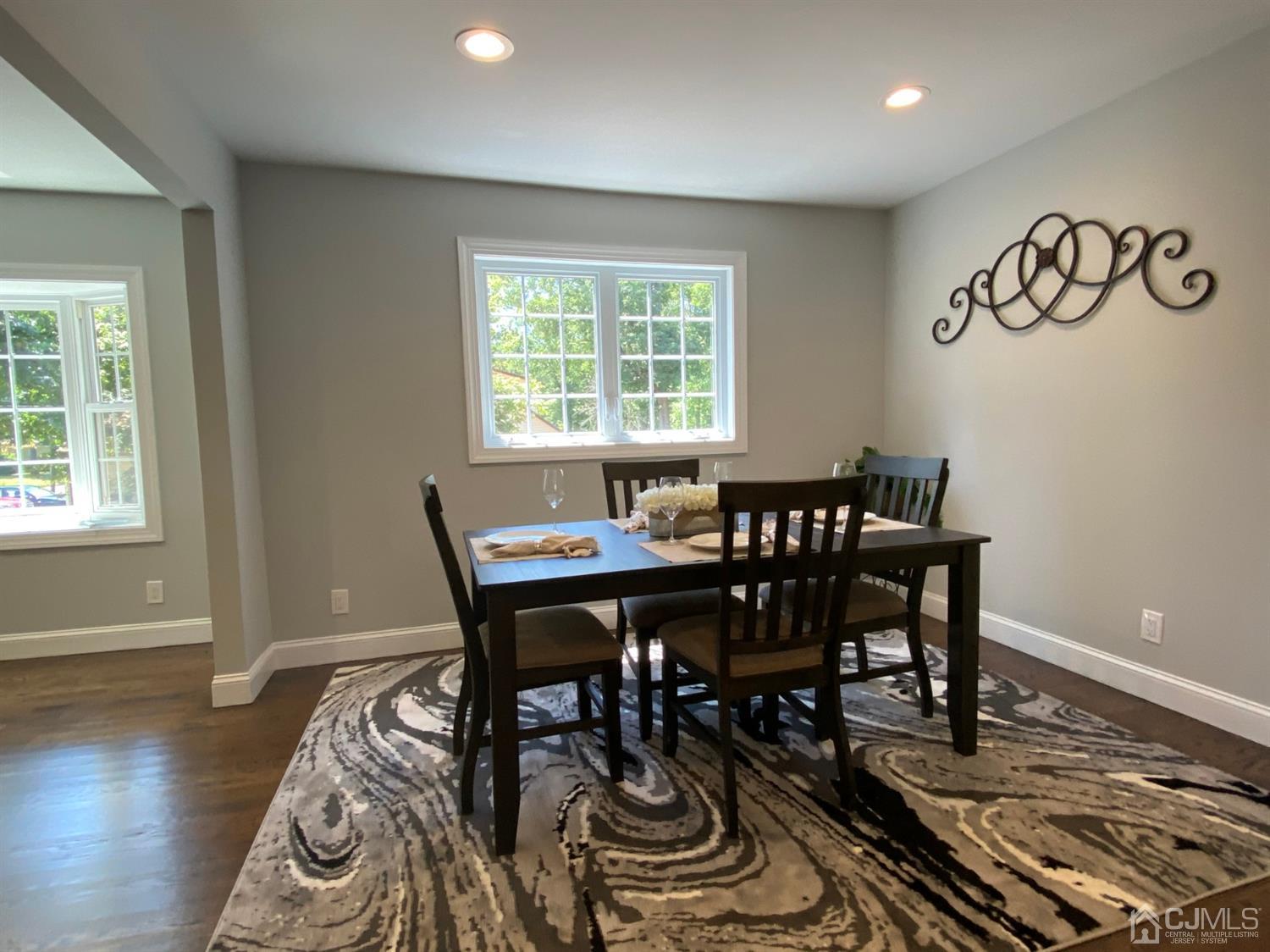 99 Jordan Road Colonia, NJ 07067 - Photo 15 of 53 a view of a dining room with furniture window and wooden floor