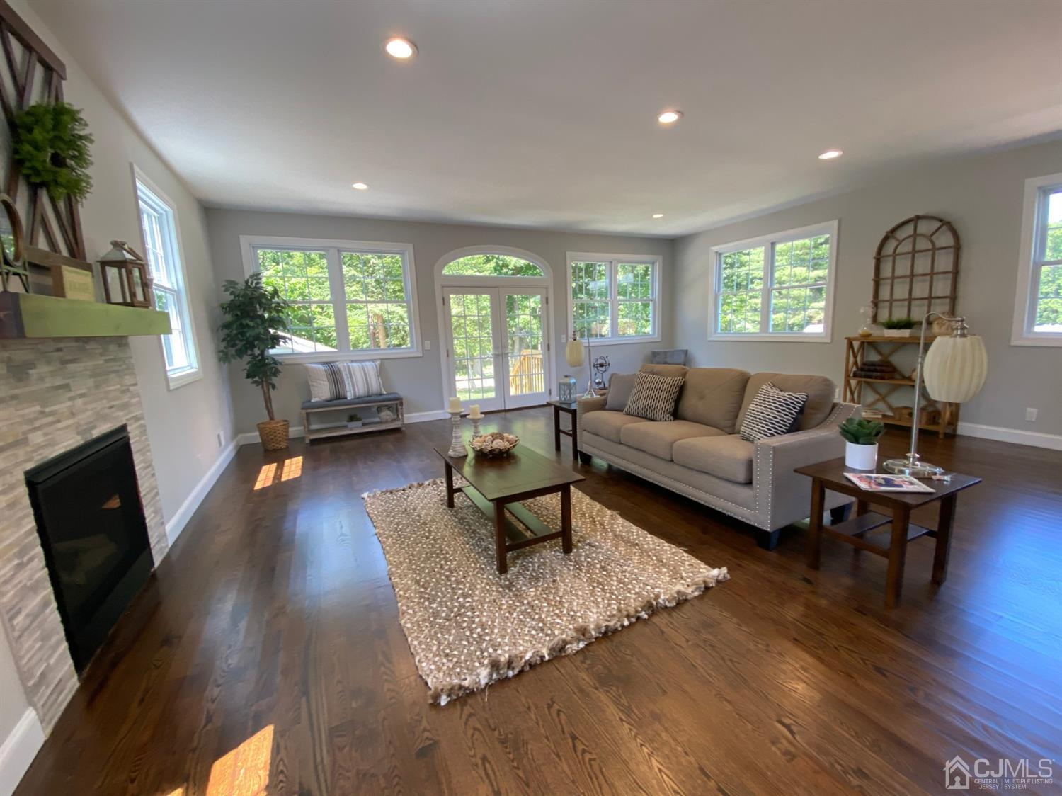 99 Jordan Road Colonia, NJ 07067 - Photo 26 of 53 a living room with furniture or fireplace and a wooden floor