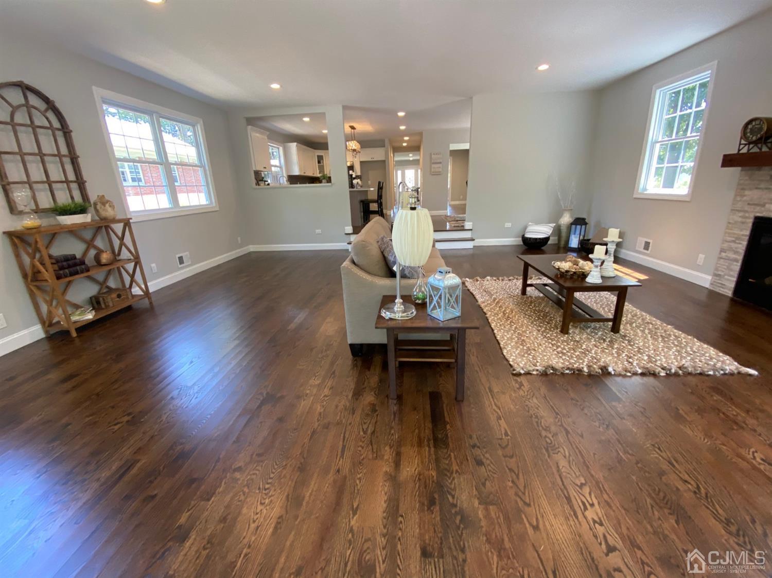 99 Jordan Road Colonia, NJ 07067 - Photo 28 of 53 a living room with furniture and wooden floor