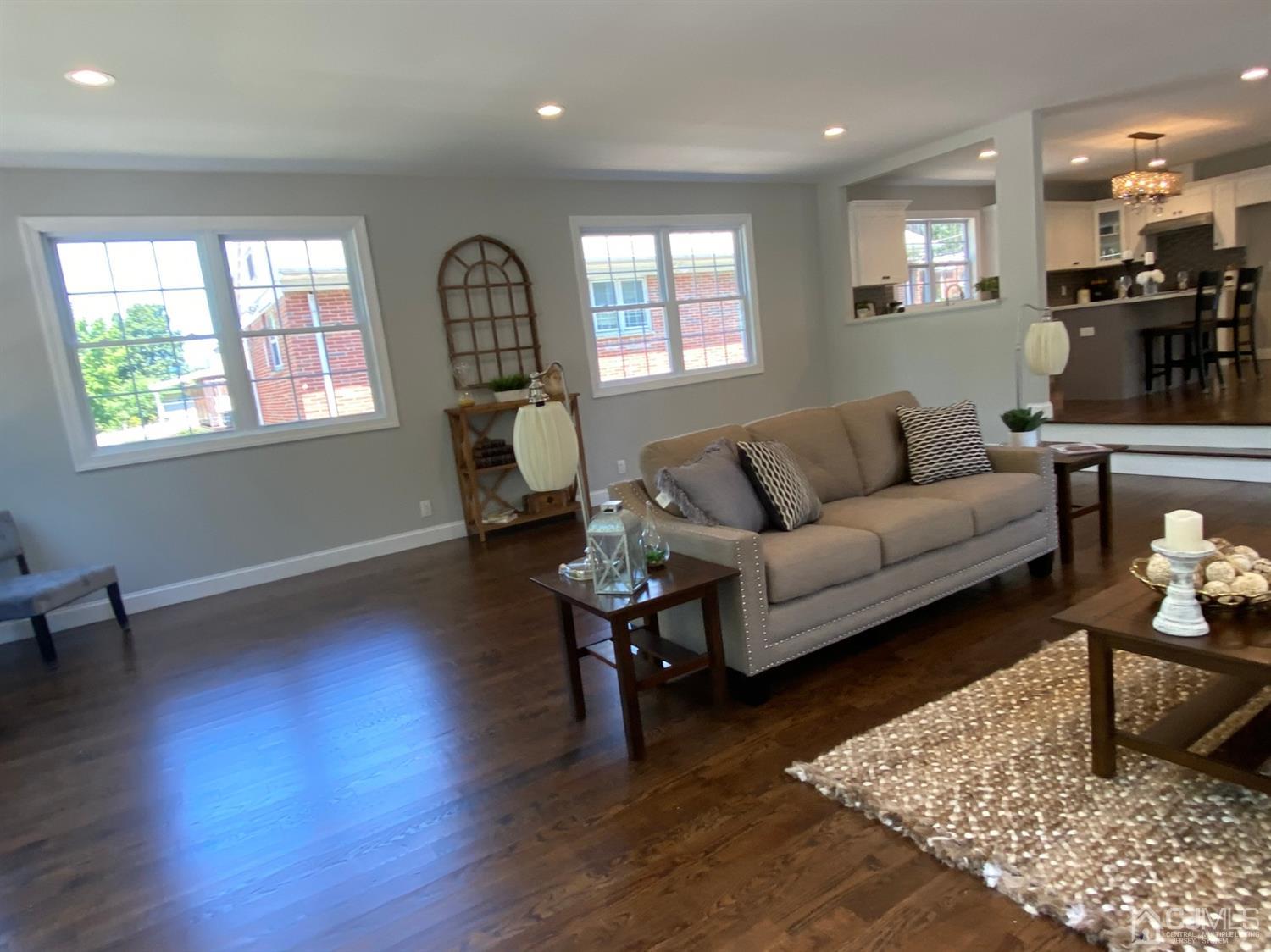 99 Jordan Road Colonia, NJ 07067 - Photo 30 of 53 a living room with furniture and wooden floor