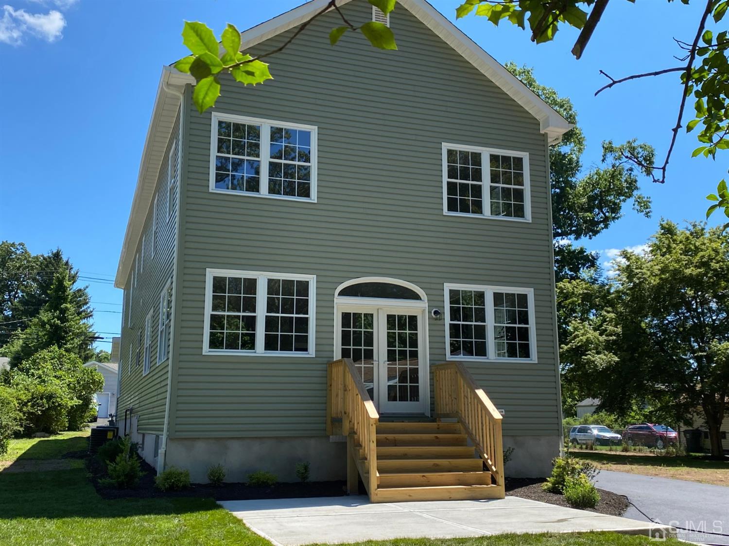 99 Jordan Road Colonia, NJ 07067 - Photo 4 of 53 a front view of a house with garden
