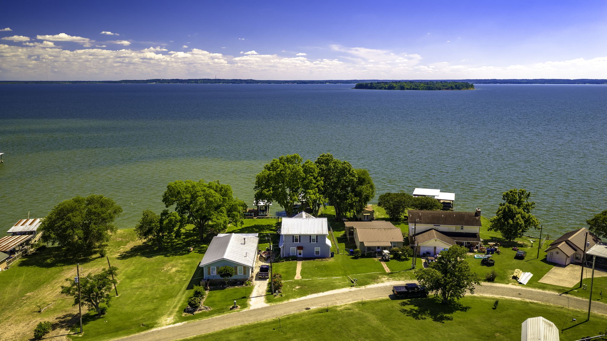536 Weavers Cove Road Livingston, TX 77351 - Photo 38 of 44 a view of a lake with houses