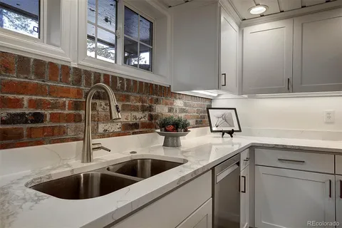 a bathroom with a toilet and shower