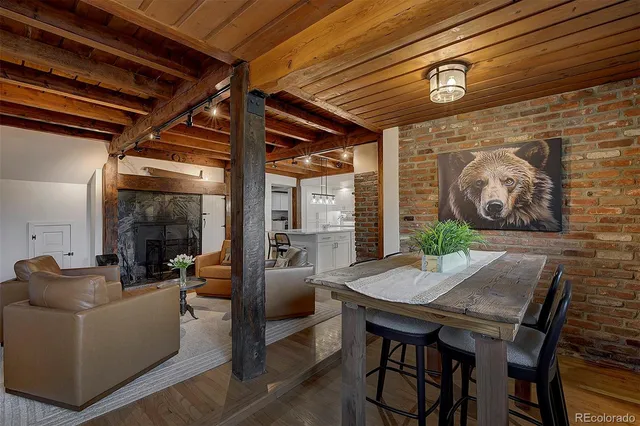 a bathroom with a toilet and shower