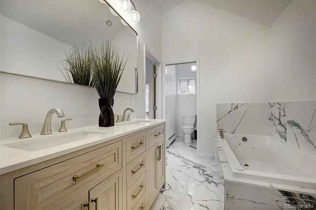 a bed room with a bed and a book shelf