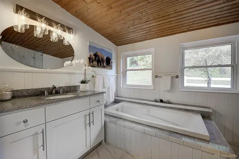 a house with trees in the background