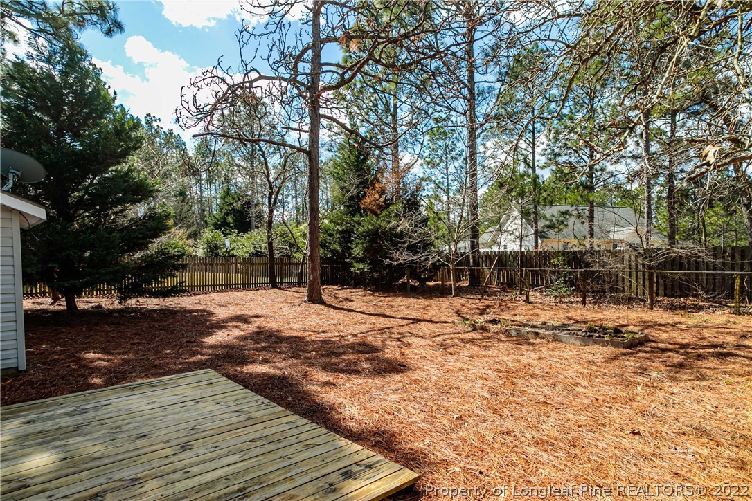 215 Fox Run Road Pinehurst, NC 28374 - Photo 21 of 24 a street view with yard