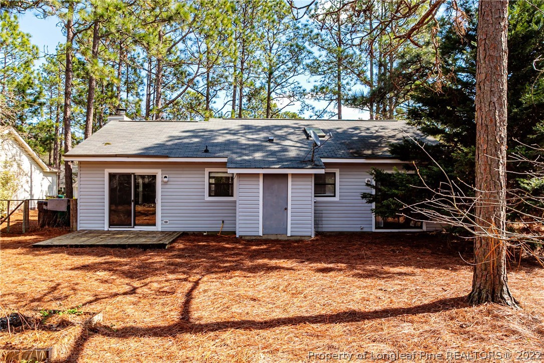 215 Fox Run Road Pinehurst, NC 28374 - Photo 23 of 24 a view of a house with a yard