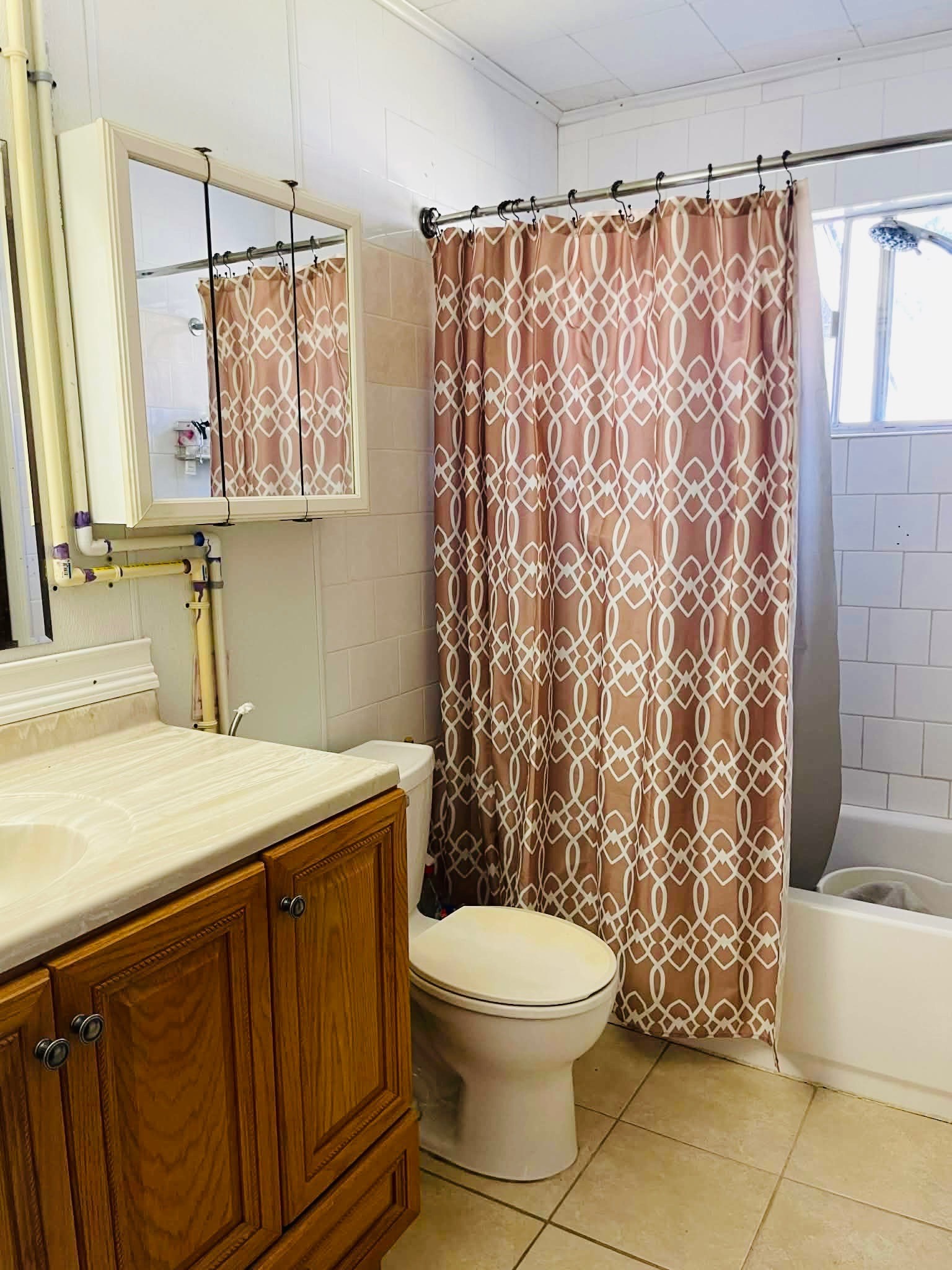 1825 Isom Street Houston, TX 77039 - Photo 20 of 27 a bathroom with a sink toilet and shower
