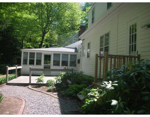 33 Hoover Road Needham, MA 02494 - Photo 5 of 6 front view of a house with a yard