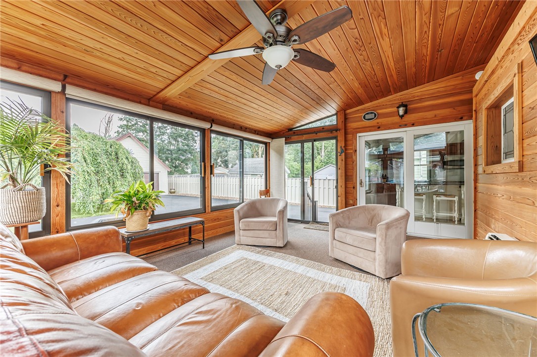 55 Elm Drive Rochester, NY 14609 - Photo 15 of 31 Sun Room has access to the yard