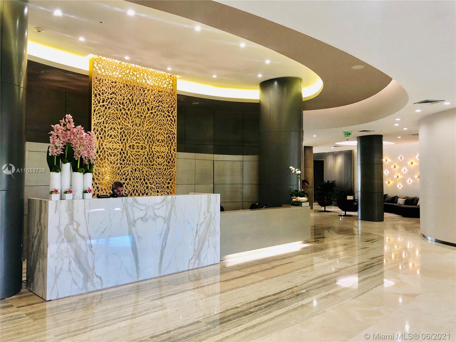 10275 Collins Avenue, Unit 425 Bal Harbour, FL 33154 - Photo 11 of 18 a view of a living room with furniture