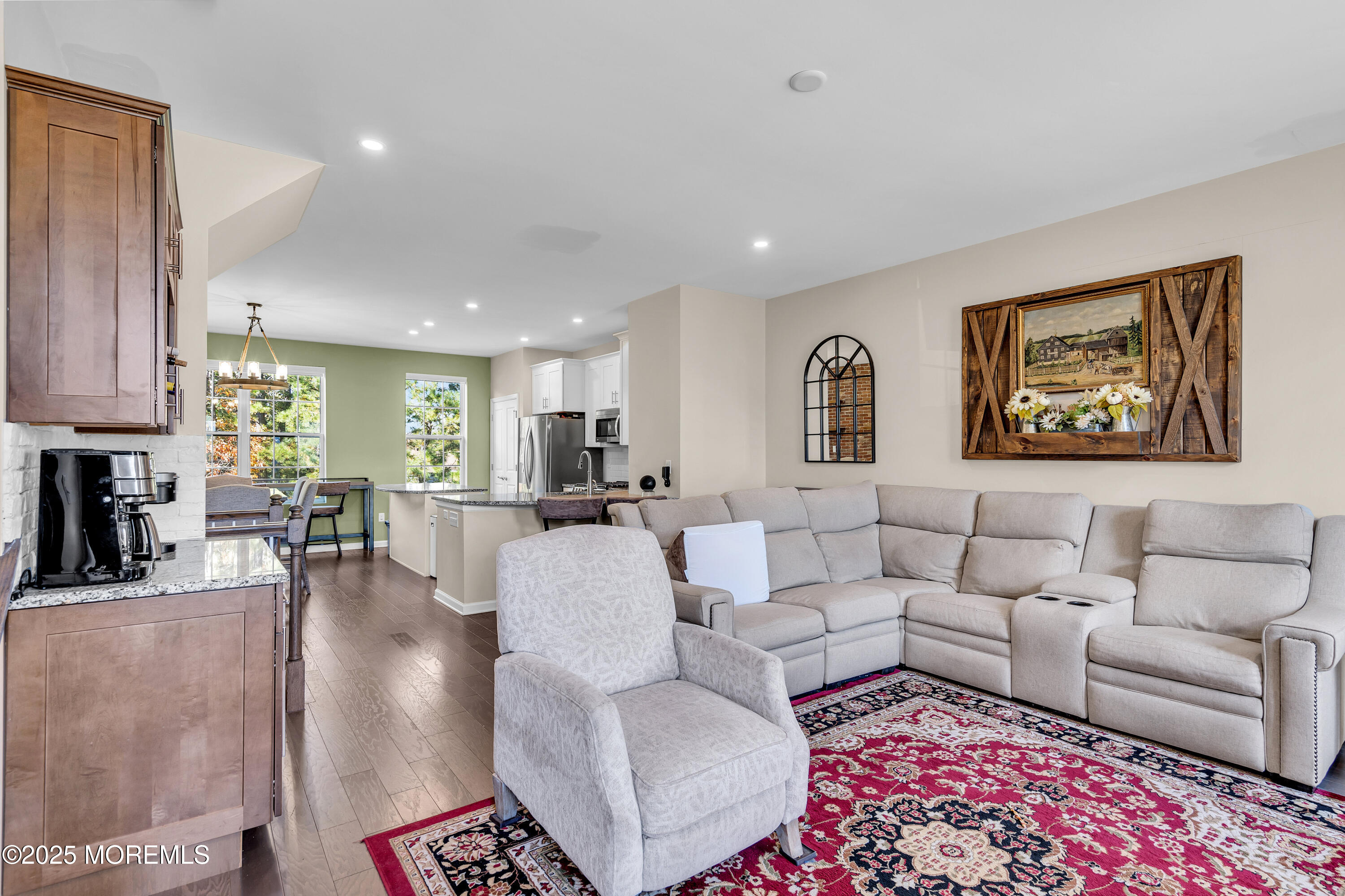 305 Spirit Way, Unit 505 Brick, NJ 08723 - Photo 11 of 28 a living room with furniture and a large window