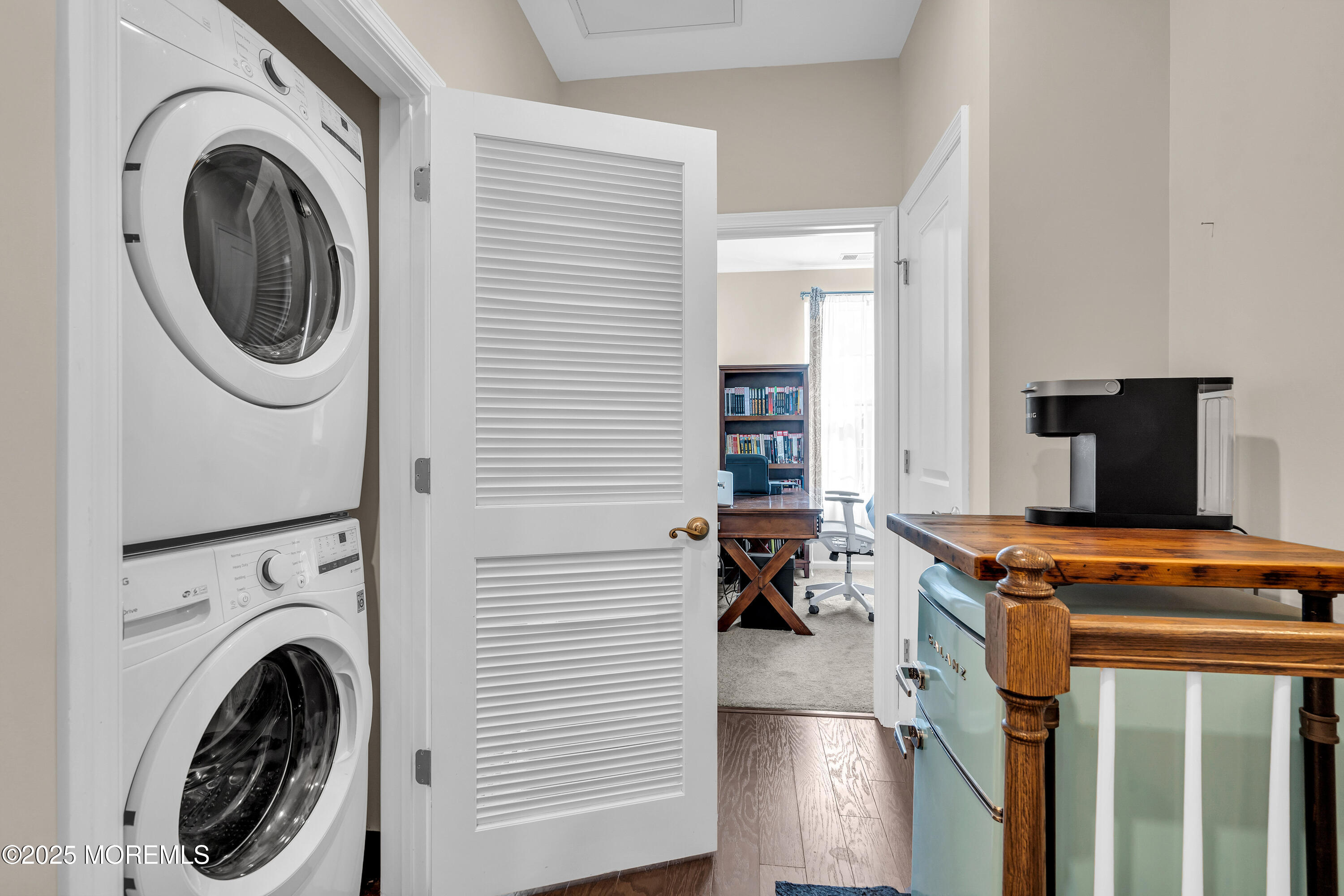 305 Spirit Way, Unit 505 Brick, NJ 08723 - Photo 26 of 28 a view of a room with washer and dryer