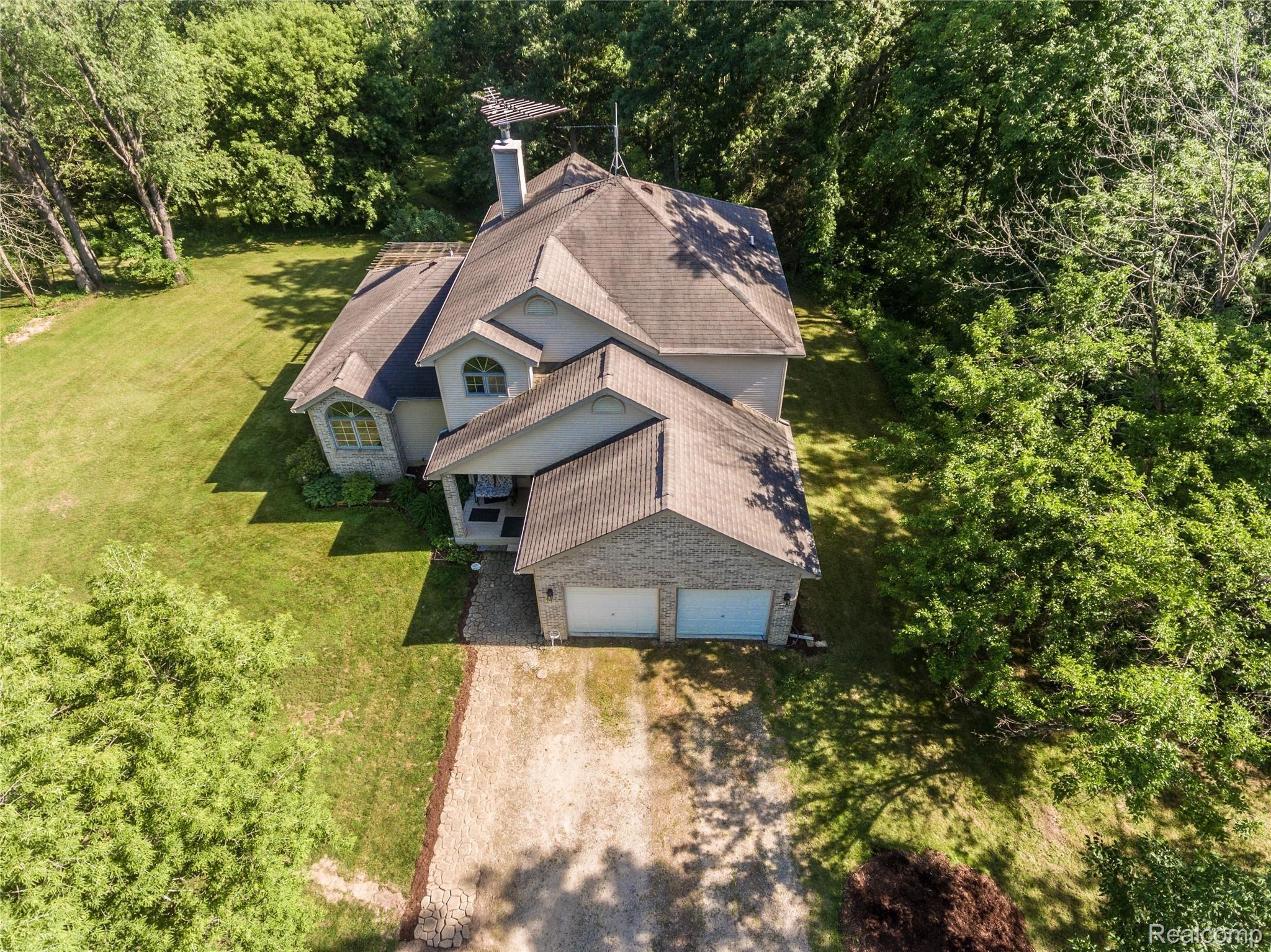 8700 Oak Grove Road Howell, MI 48855 - Photo 1 of 38 DJI_0076-17.jpg
