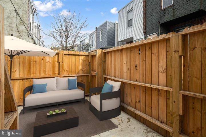 921 South Alden Street Philadelphia, PA 19143 - Photo 13 of 28 a outdoor space with patio furniture
