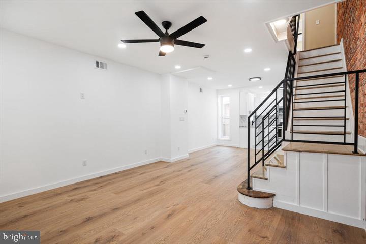 921 South Alden Street Philadelphia, PA 19143 - Photo 6 of 28 a view of entryway and hall with wooden floor