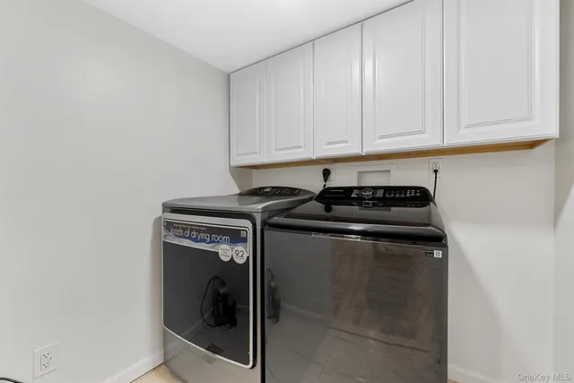 a close view of a stove and cabinets