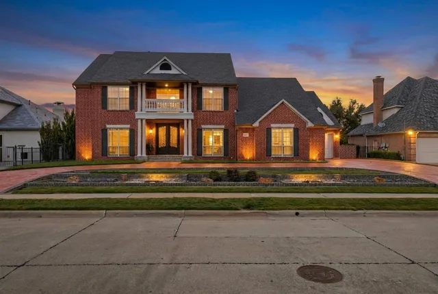 an aerial view of a house with a garden