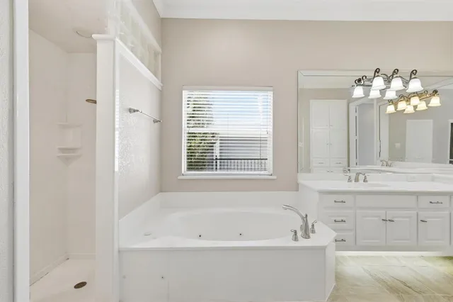 a bed room with furniture and a window