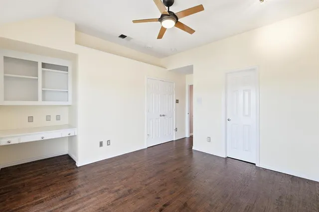 a living room with furniture a rug and a window