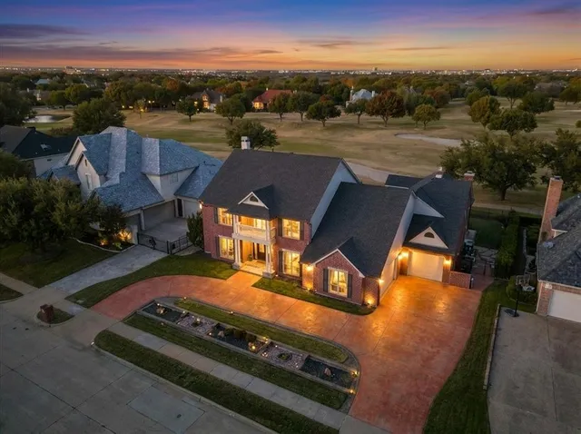 a view of a swimming pool with a yard