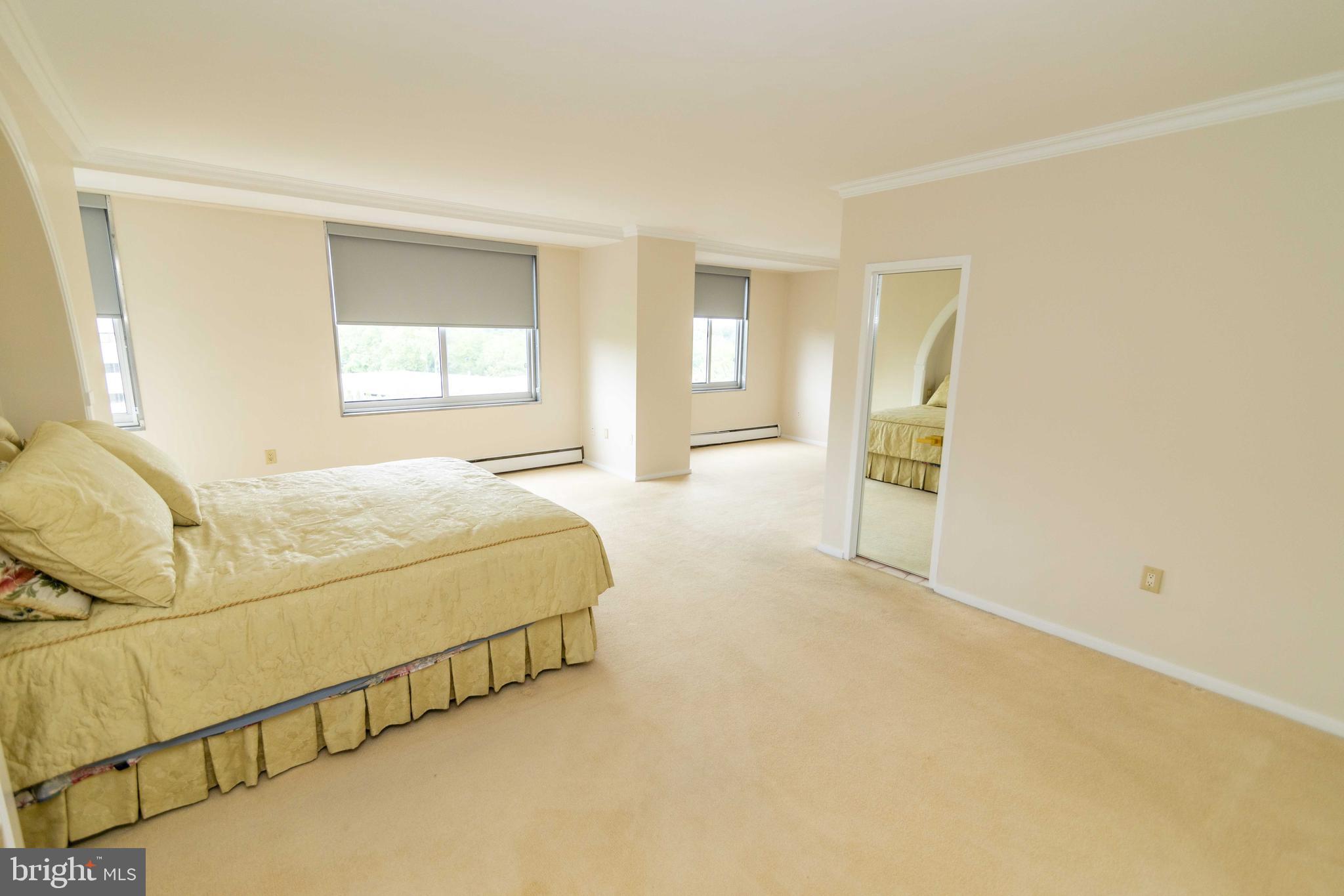 191 Presidential Boulevard, Unit R721722 Bala Cynwyd, PA 19004 - Photo 20 of 37 Sitting Area to Bedroom Space