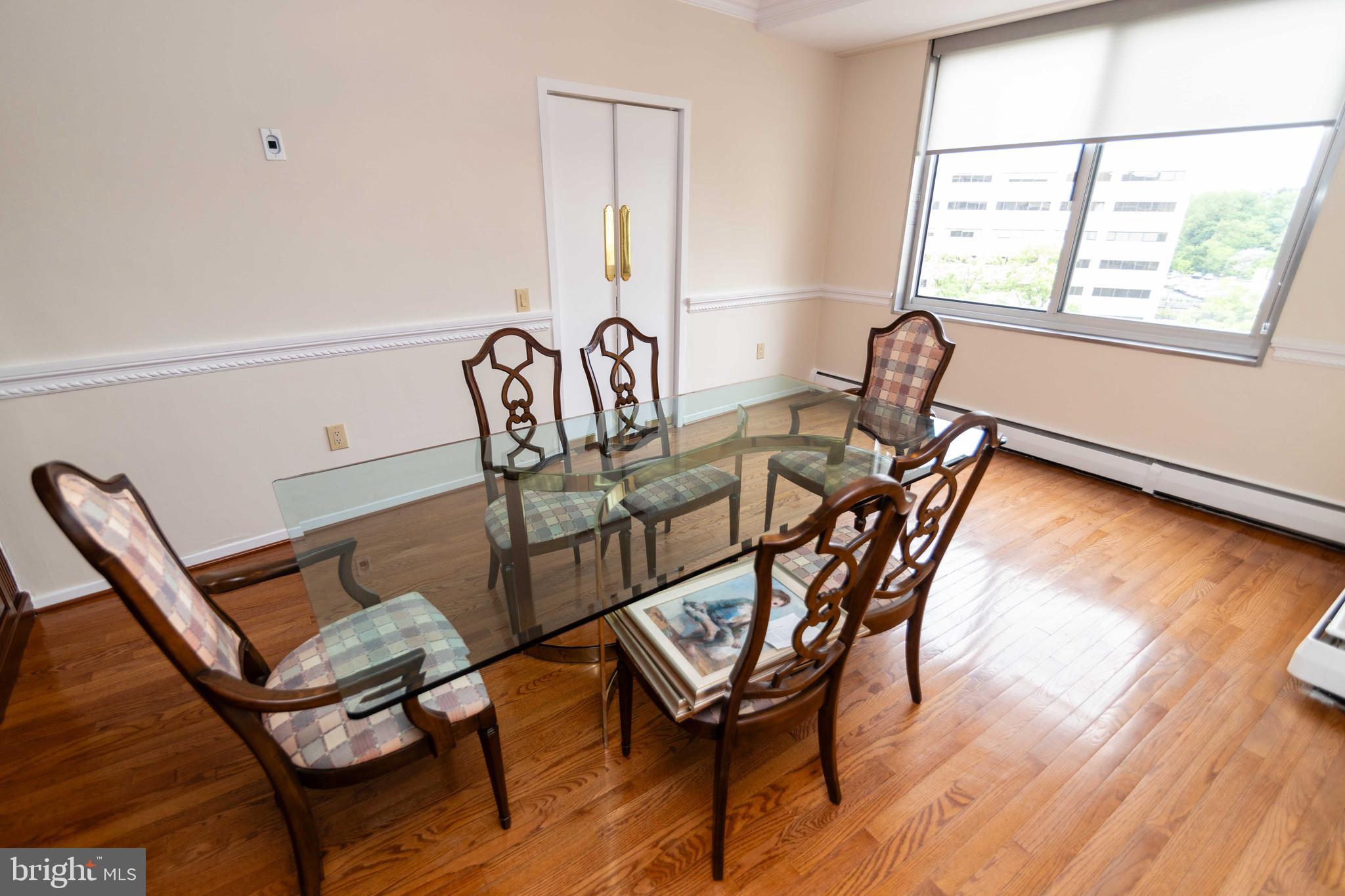 191 Presidential Boulevard, Unit R721722 Bala Cynwyd, PA 19004 - Photo 10 of 37 Dining Room with Chair Rail Trim