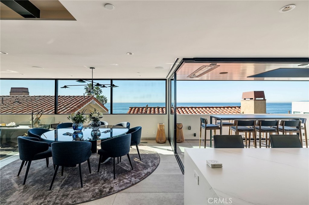 121 25th Street Manhattan Beach, CA 90266 - Photo 34 of 75 a dining room with furniture and a table