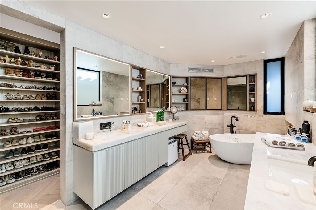 121 25th Street Manhattan Beach, CA 90266 - Photo 43 of 75 a bathroom with a sink double vanity and a mirror