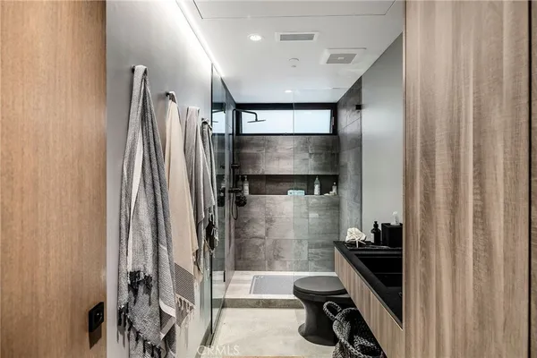 a picture of a bathroom with a window