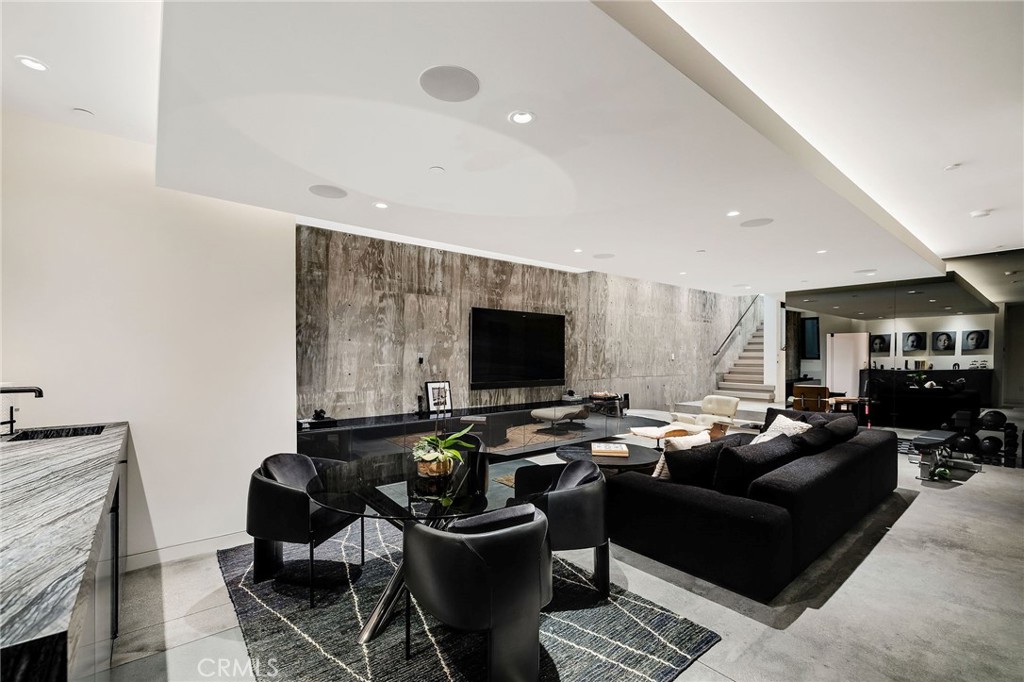 121 25th Street Manhattan Beach, CA 90266 - Photo 61 of 75 a living room with furniture and a flat screen tv