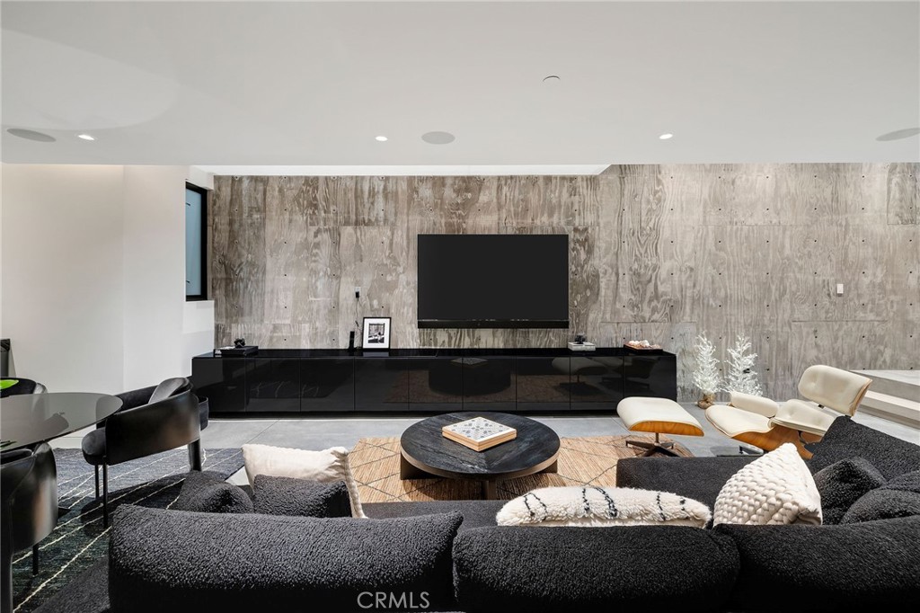 121 25th Street Manhattan Beach, CA 90266 - Photo 62 of 75 a living room with furniture and a flat screen tv