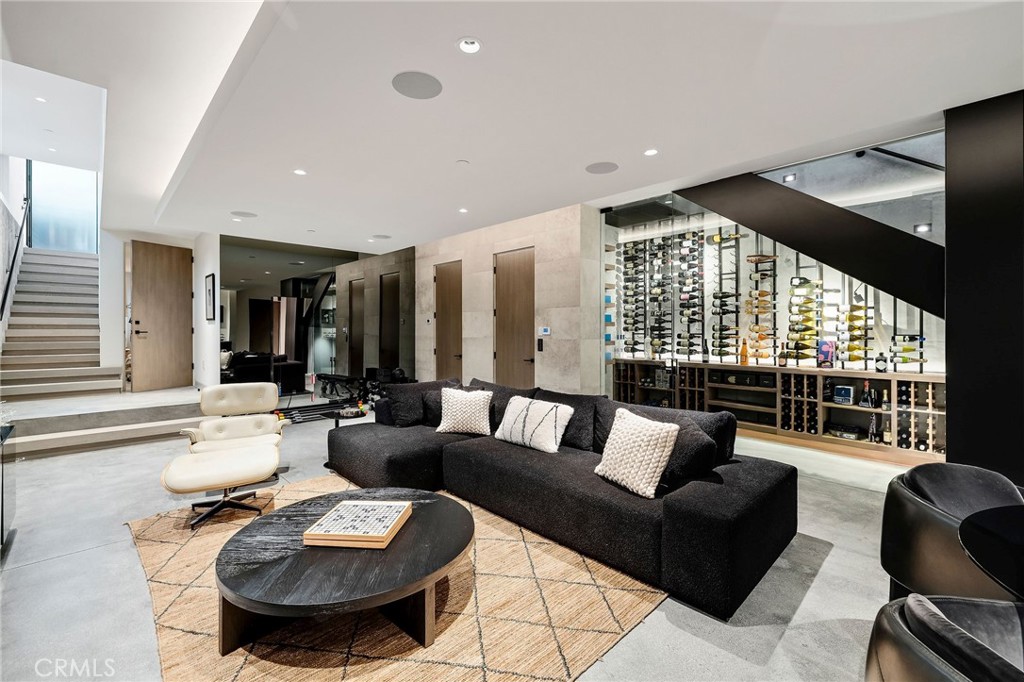 121 25th Street Manhattan Beach, CA 90266 - Photo 65 of 75 a living room with furniture and a large window