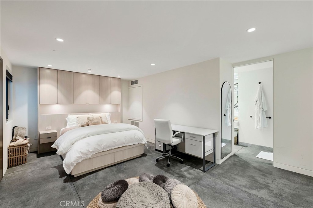 121 25th Street Manhattan Beach, CA 90266 - Photo 69 of 75 a spacious bedroom with a bed and a window