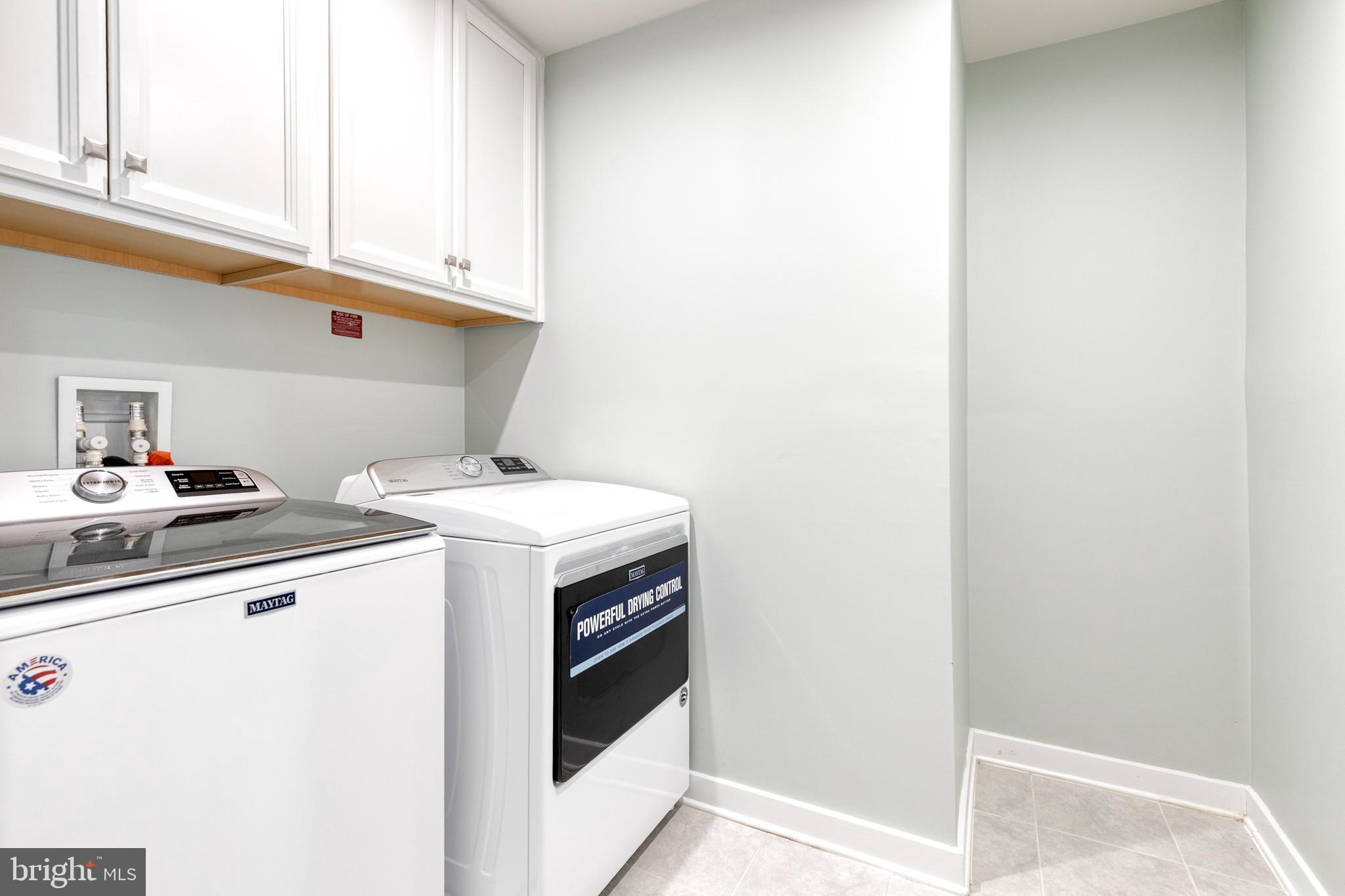 6003 Valentine Way Hanover, MD 21076 - Photo 44 of 52 a utility room with dryer and washer