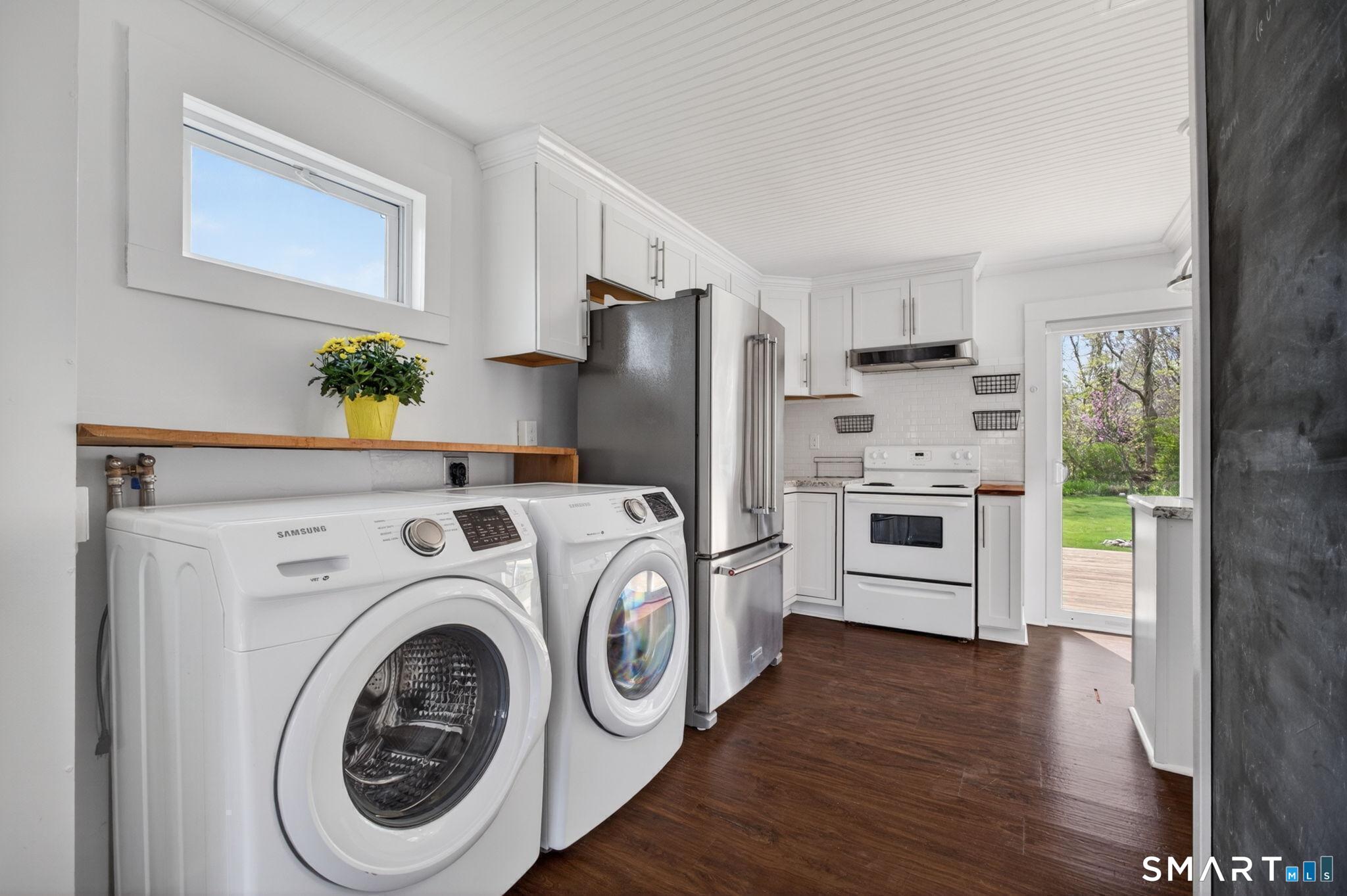 61 Ingham Hill Road Old Saybrook, CT 06475 - Photo 11 of 32 a view of kitchen with washer and dryer