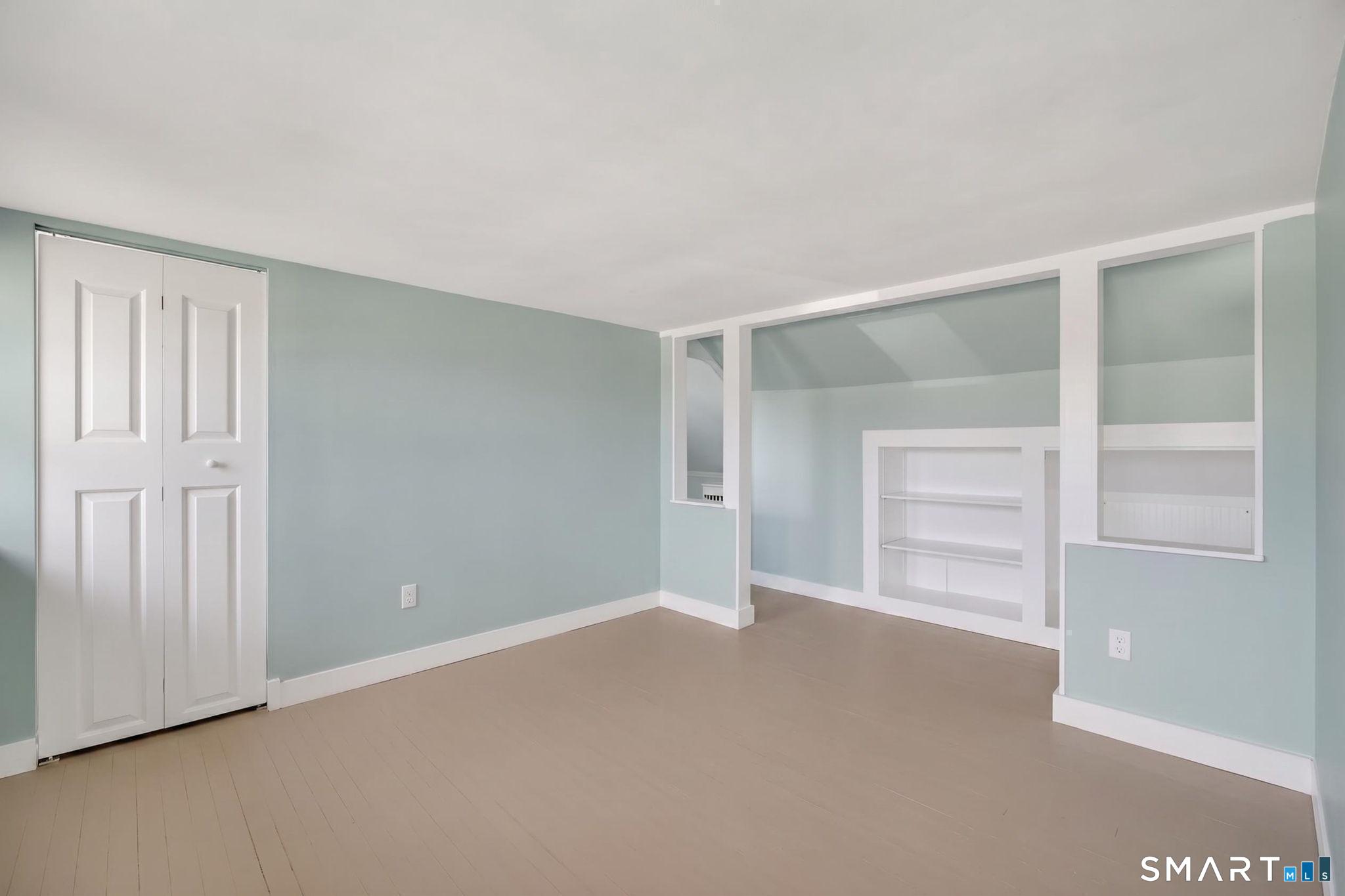 61 Ingham Hill Road Old Saybrook, CT 06475 - Photo 19 of 32 an empty room with windows