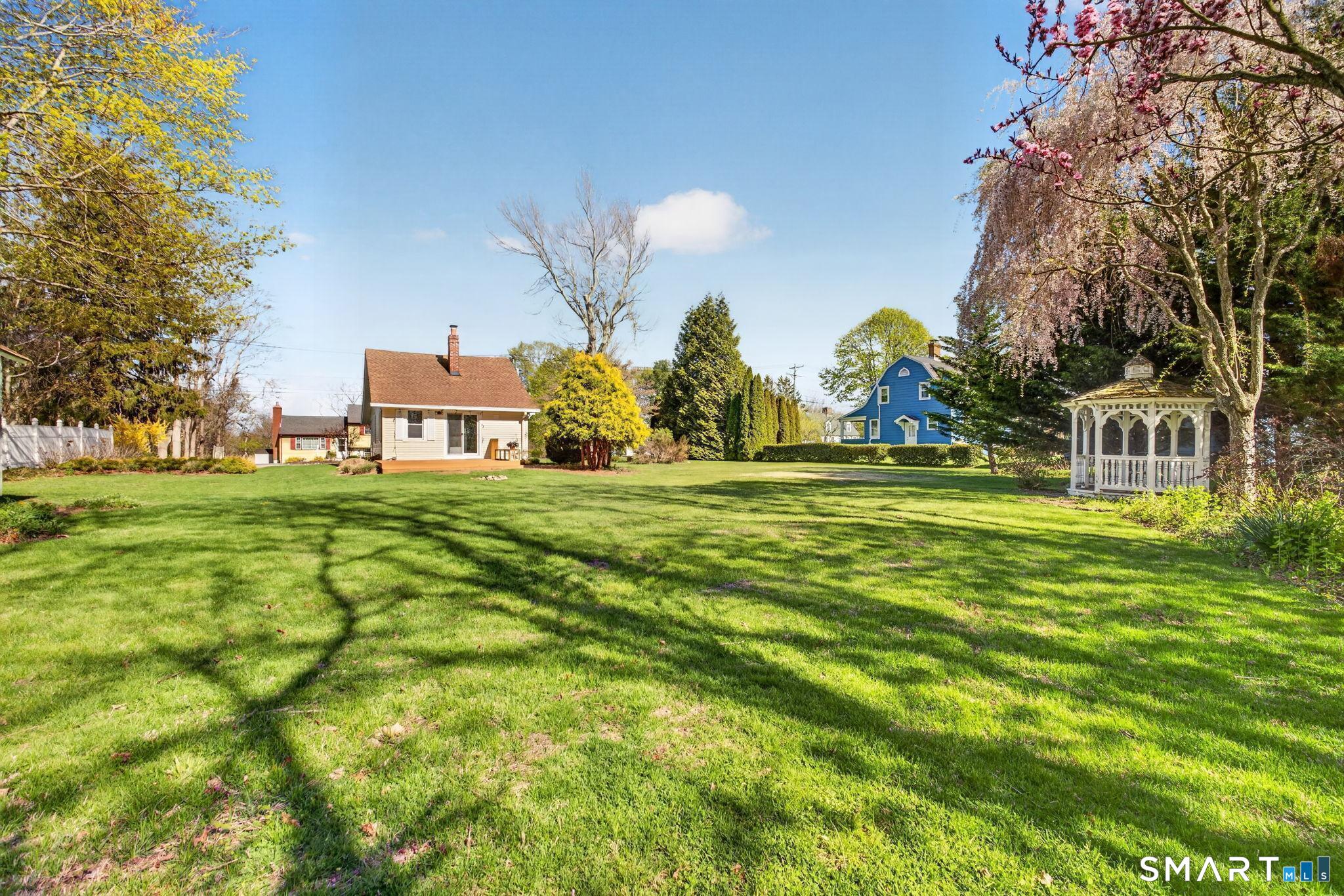 61 Ingham Hill Road Old Saybrook, CT 06475 - Photo 25 of 32 a house view with swimming pool in outdoor space