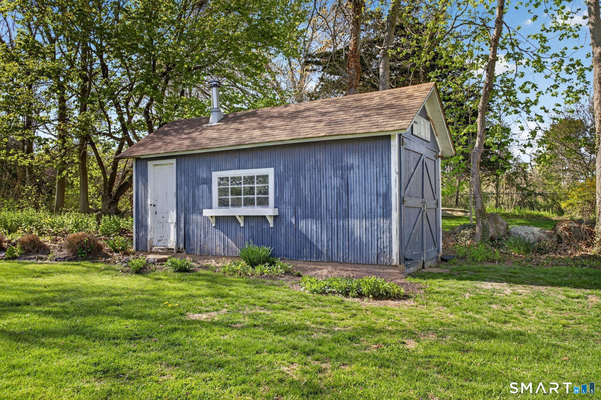 61 Ingham Hill Road Old Saybrook, CT 06475 - Photo 29 of 32 a view of a back yard of the house