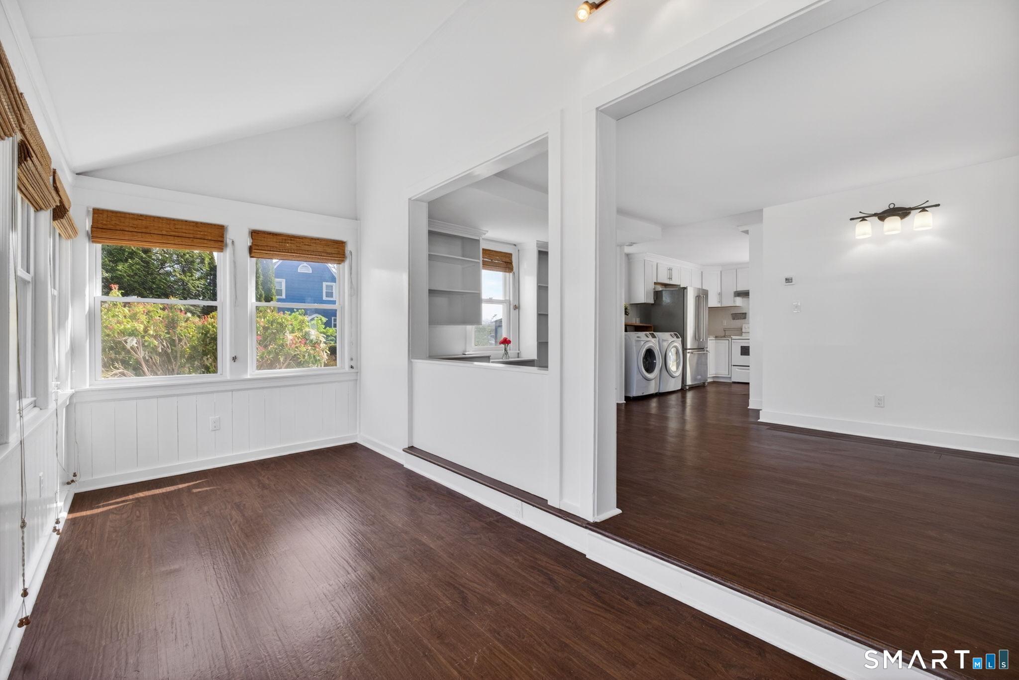61 Ingham Hill Road Old Saybrook, CT 06475 - Photo 5 of 32 wooden floor in an empty room with a window