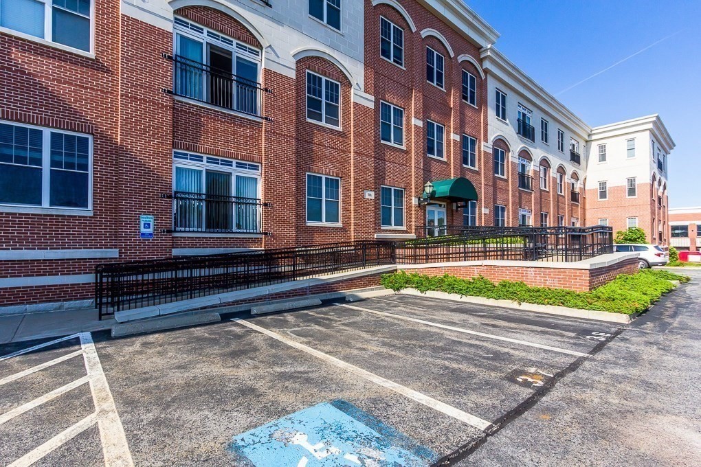 500 Union Street, Unit 5304 Westborough, MA 01581 - Photo 20 of 26 a swimming pool with outdoor view and tall buildings
