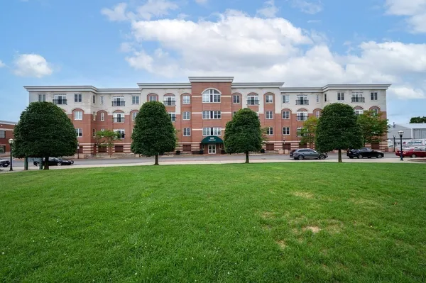 a view of a building and garden