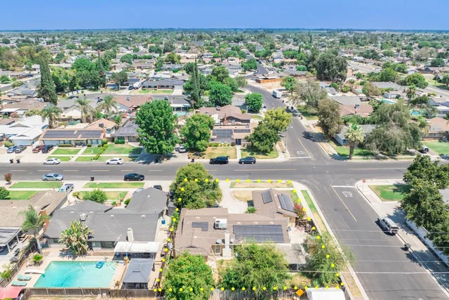 an aerial view of a house with a garden