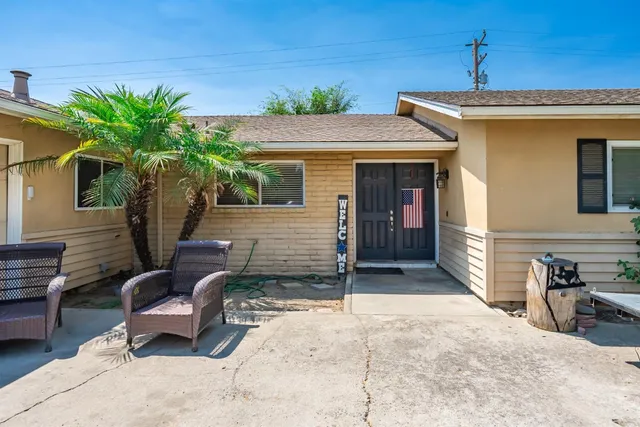 a view of a house with a patio