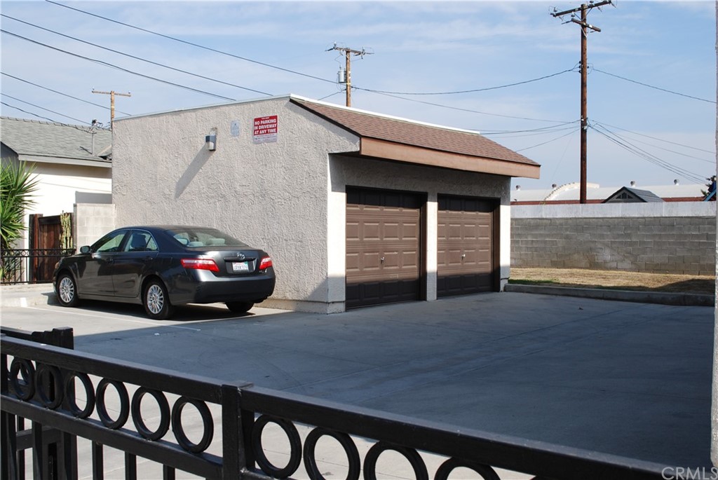 3419 Gregory Avenue Fullerton, CA 92833 - Photo 8 of 8 a view of a car park in front of a house