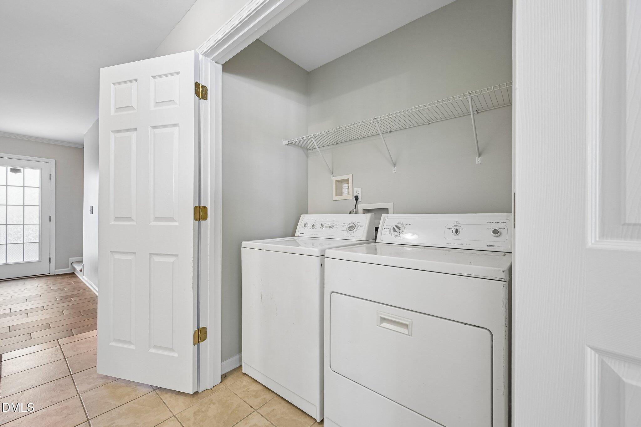 278 South Raleigh Street Angier, NC 27501 - Photo 28 of 35 a utility room with dryer and washer