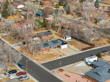 an aerial view of residential building and ocean view